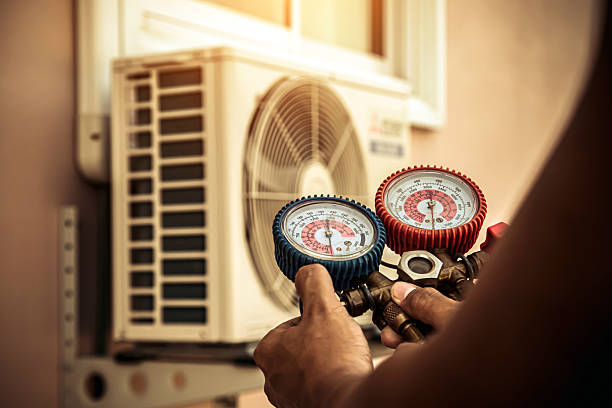 Professional Heat Pump Repair technician working in Morehead City, NC